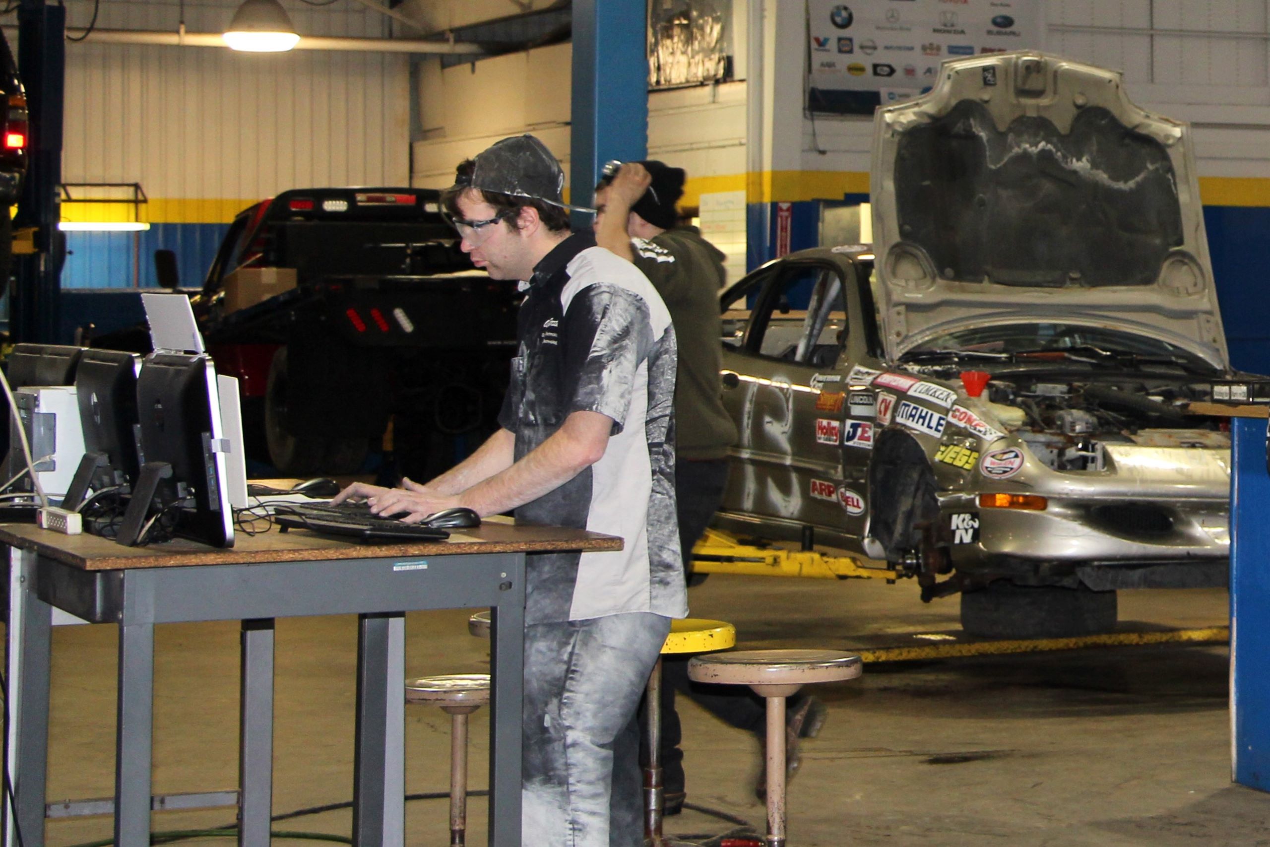 Students in a Western New York Works automotive career training program learn to operate an auto body shop.